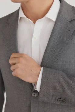 Blazer estilo olho de pássaro com dois elásticos e corte slim