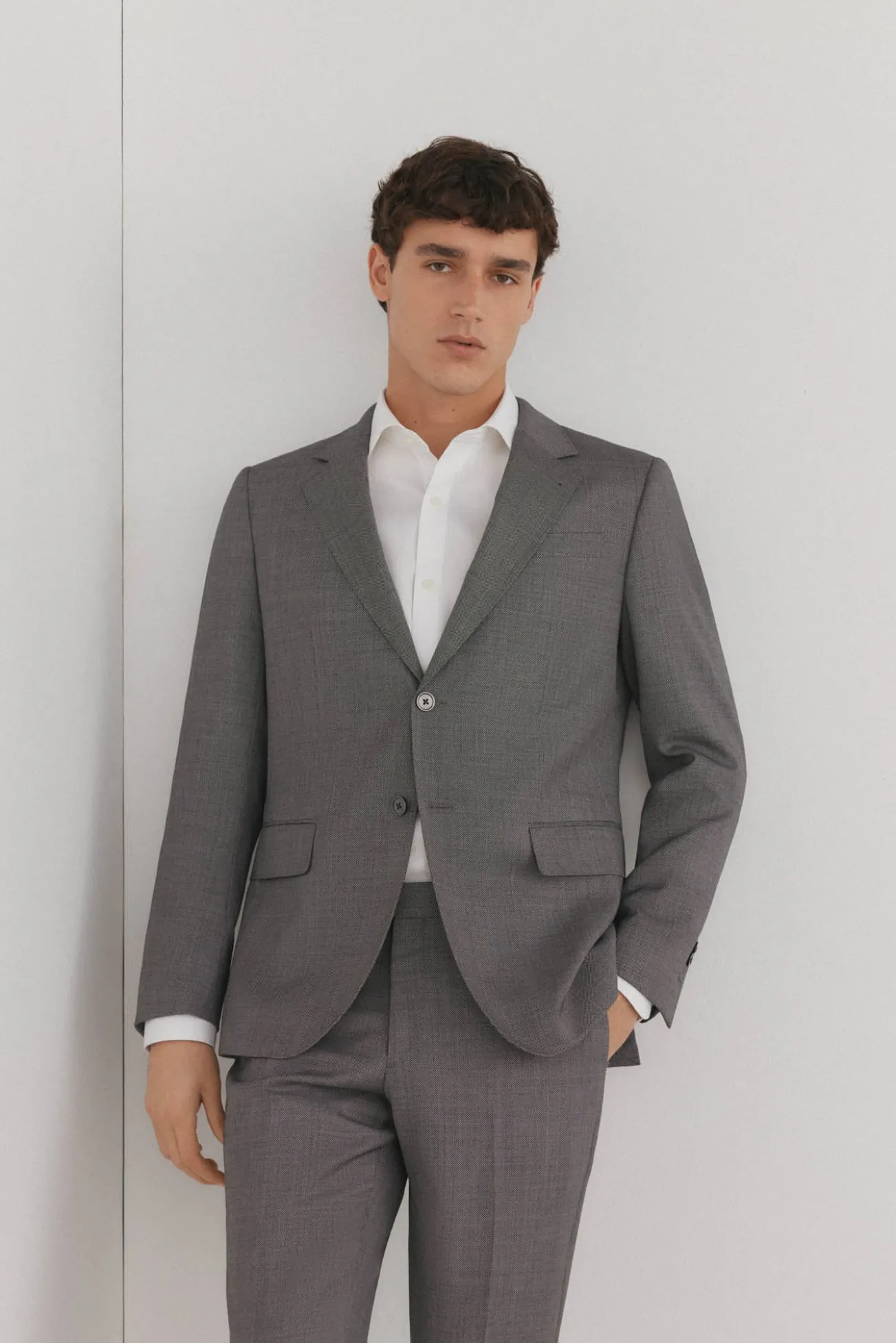 Blazer estilo olho de pássaro com dois elásticos e corte slim