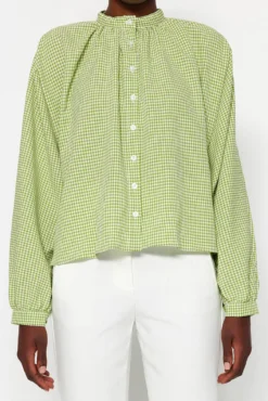 Blusa abotoada
