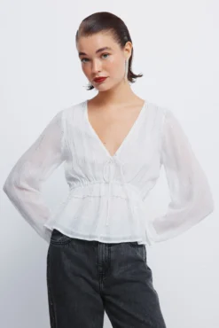 Blusa de lurex com cós elástico