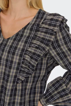 Blusa de manga comprida com babados