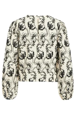 Blusa de tecido bordado