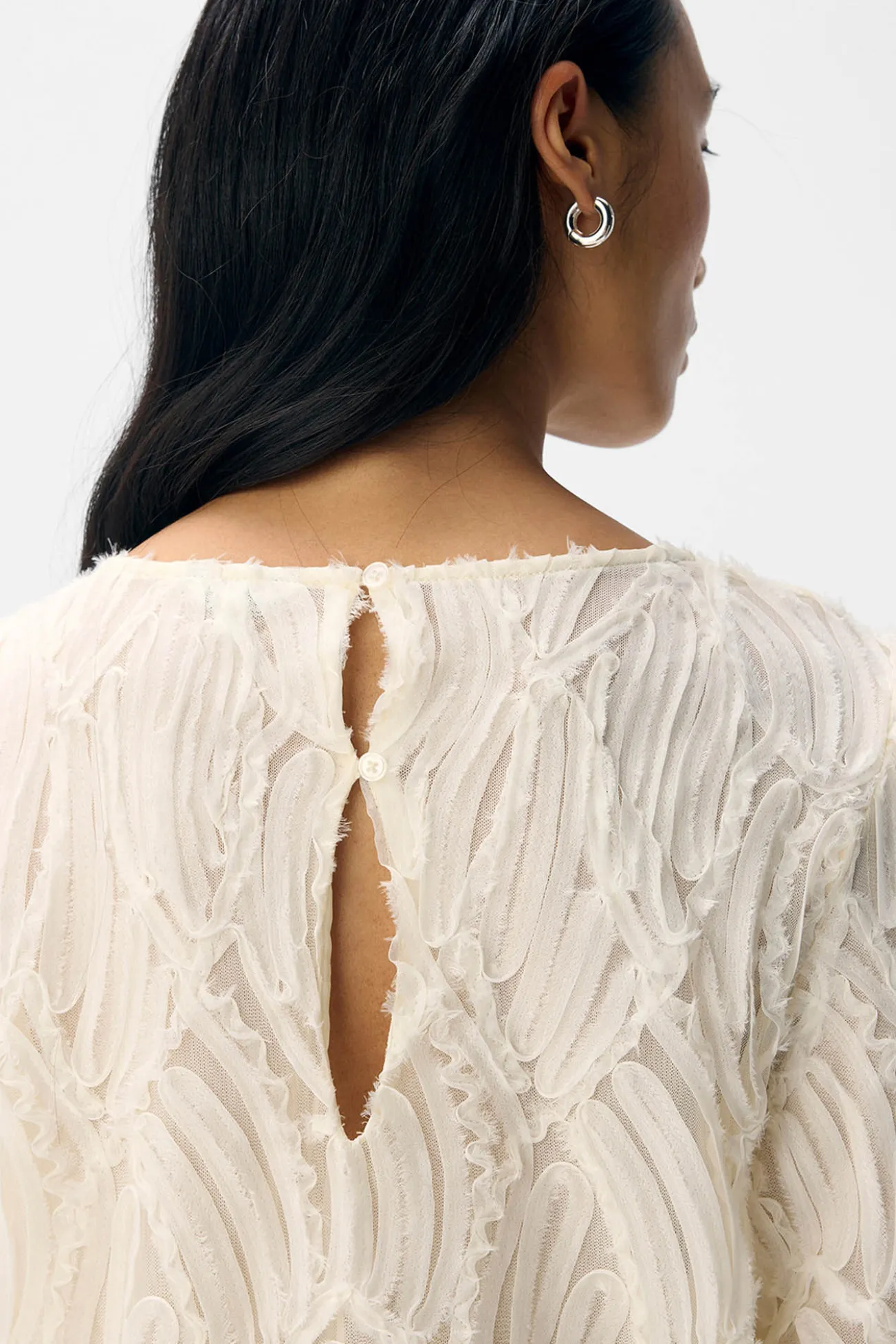 Blusa de tecido texturizado
