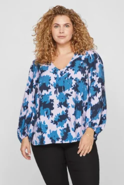 Blusa estampada manga comprida curvilínea