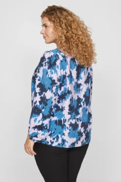 Blusa estampada manga comprida curvilínea