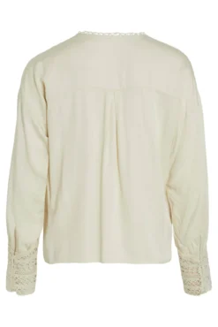 Blusa manga comprida bordada