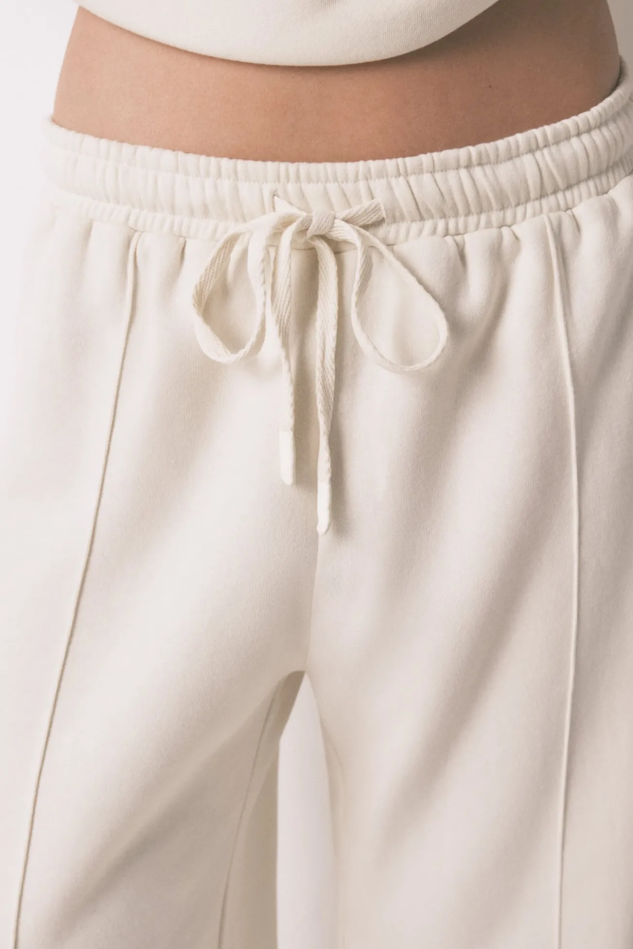 Calça comprida branca de pelúcia fina