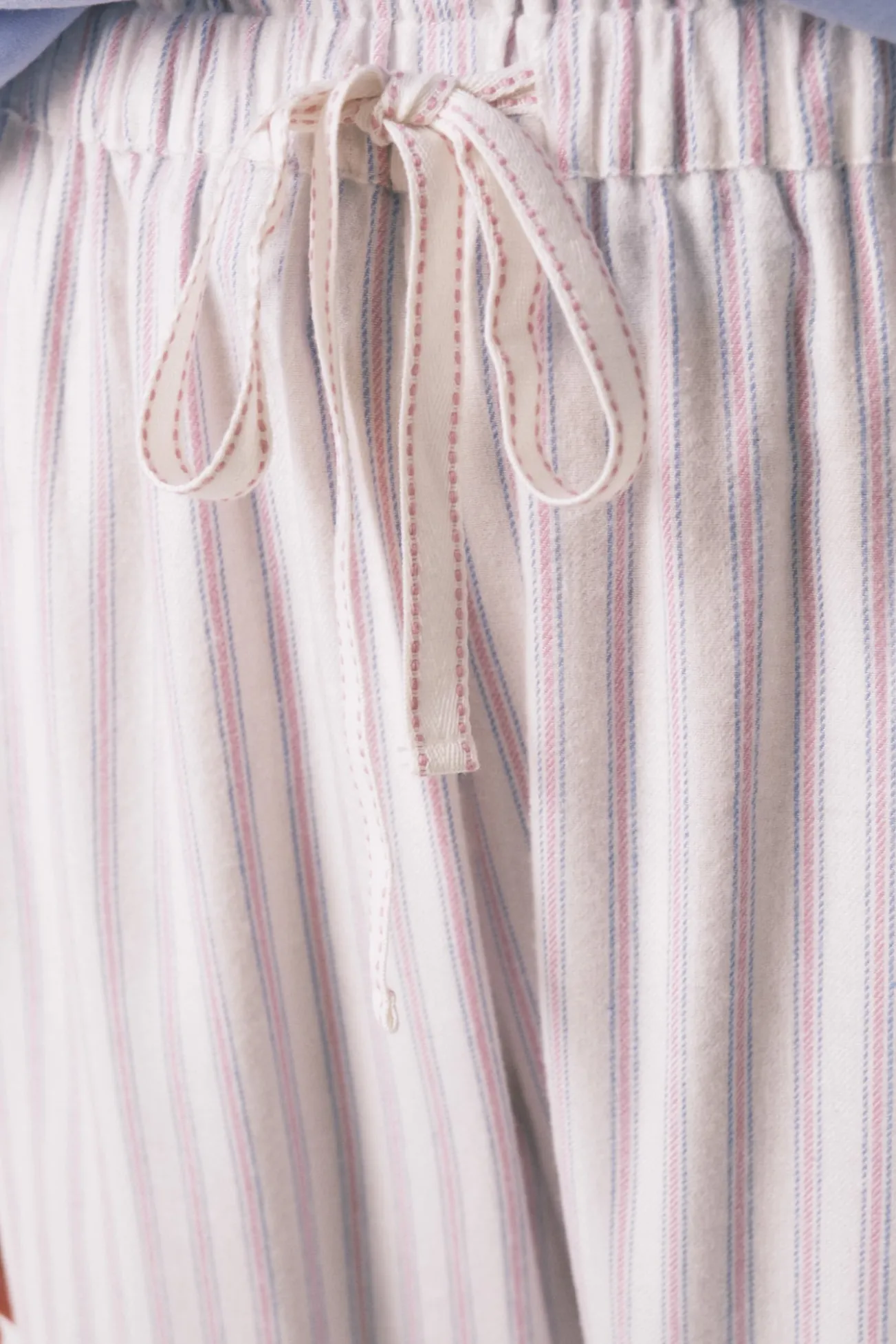 Calça comprida de flanela com estampa riscas multicolorida