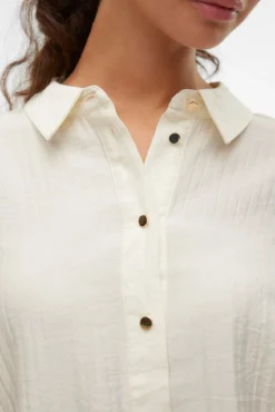 Camisa de manga comprida com pregas nas costas