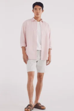Camisa polo riscas