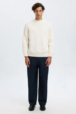 Camisola de gola alta 100% algodão orgânico.