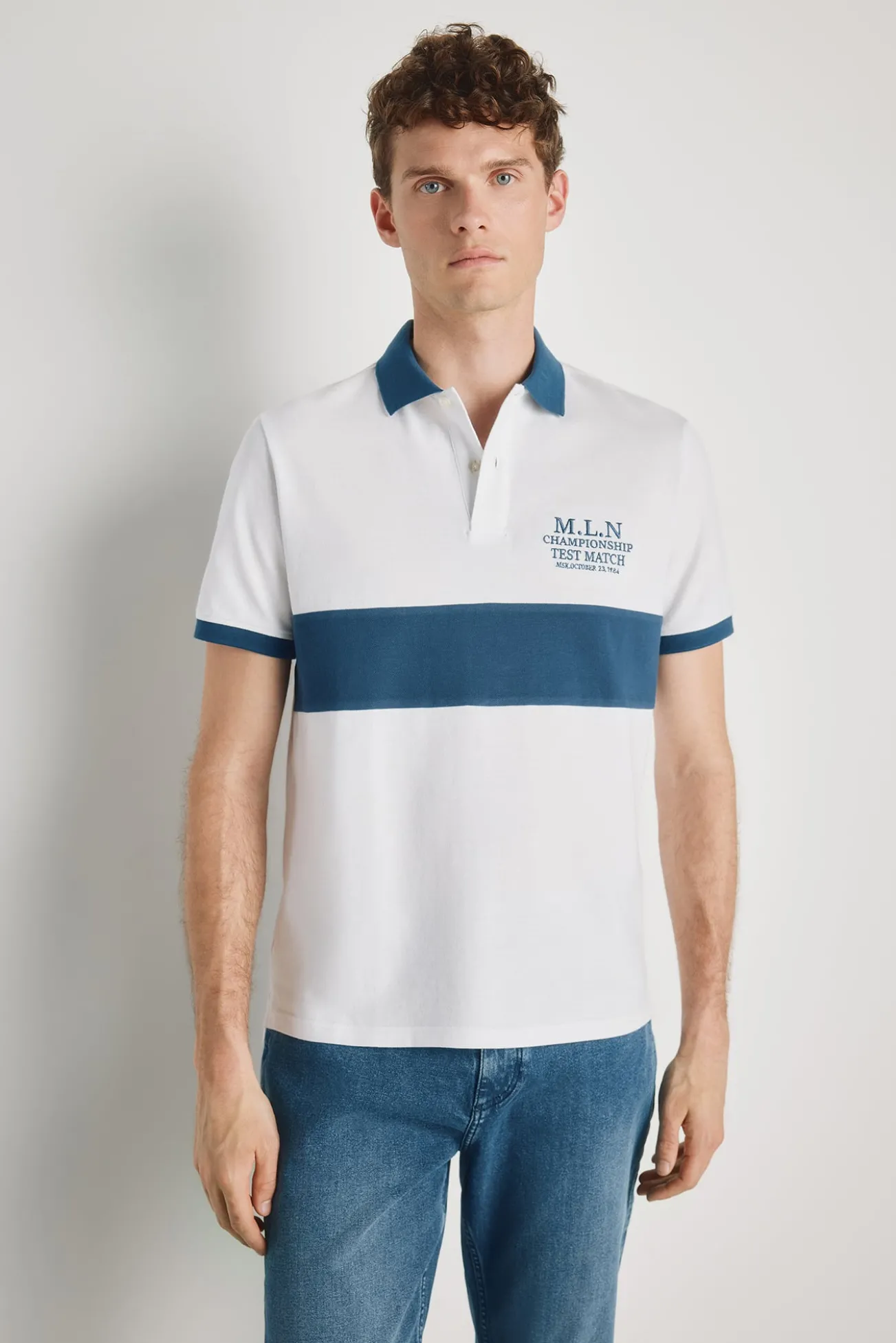 Polo de riscas de manga curta