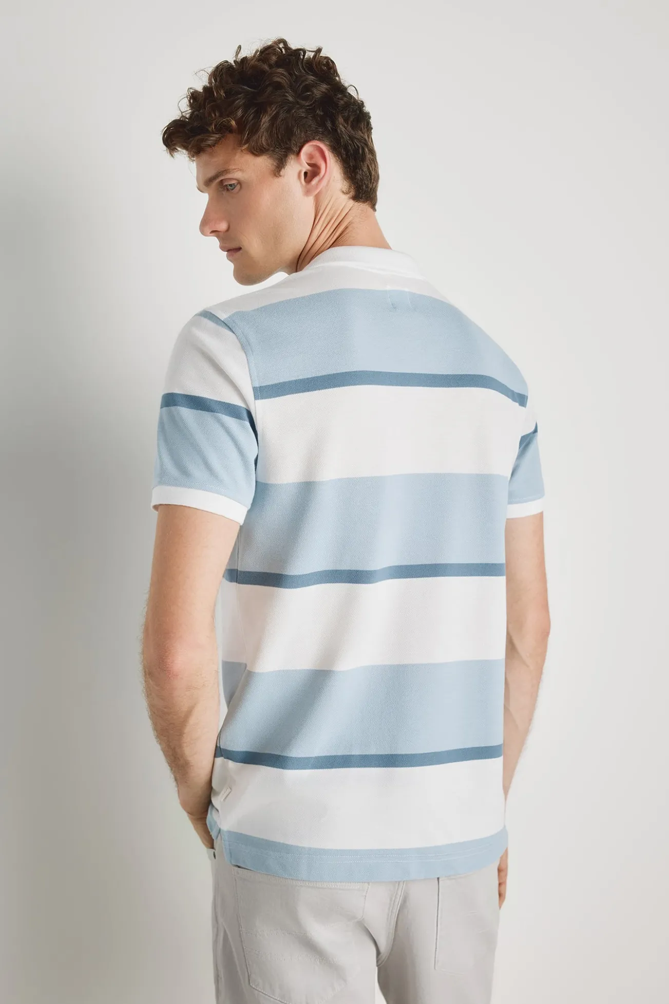Polo de riscas de manga curta