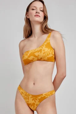 Top de biquíni amarelo assimétrico