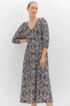 Vestido estampado manga morcego